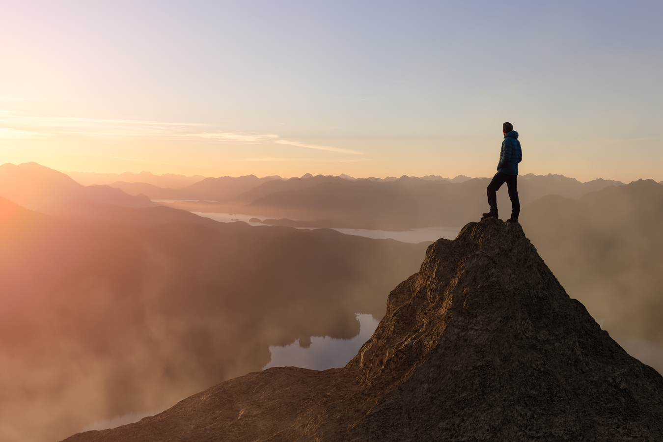 Man on a mountain summit